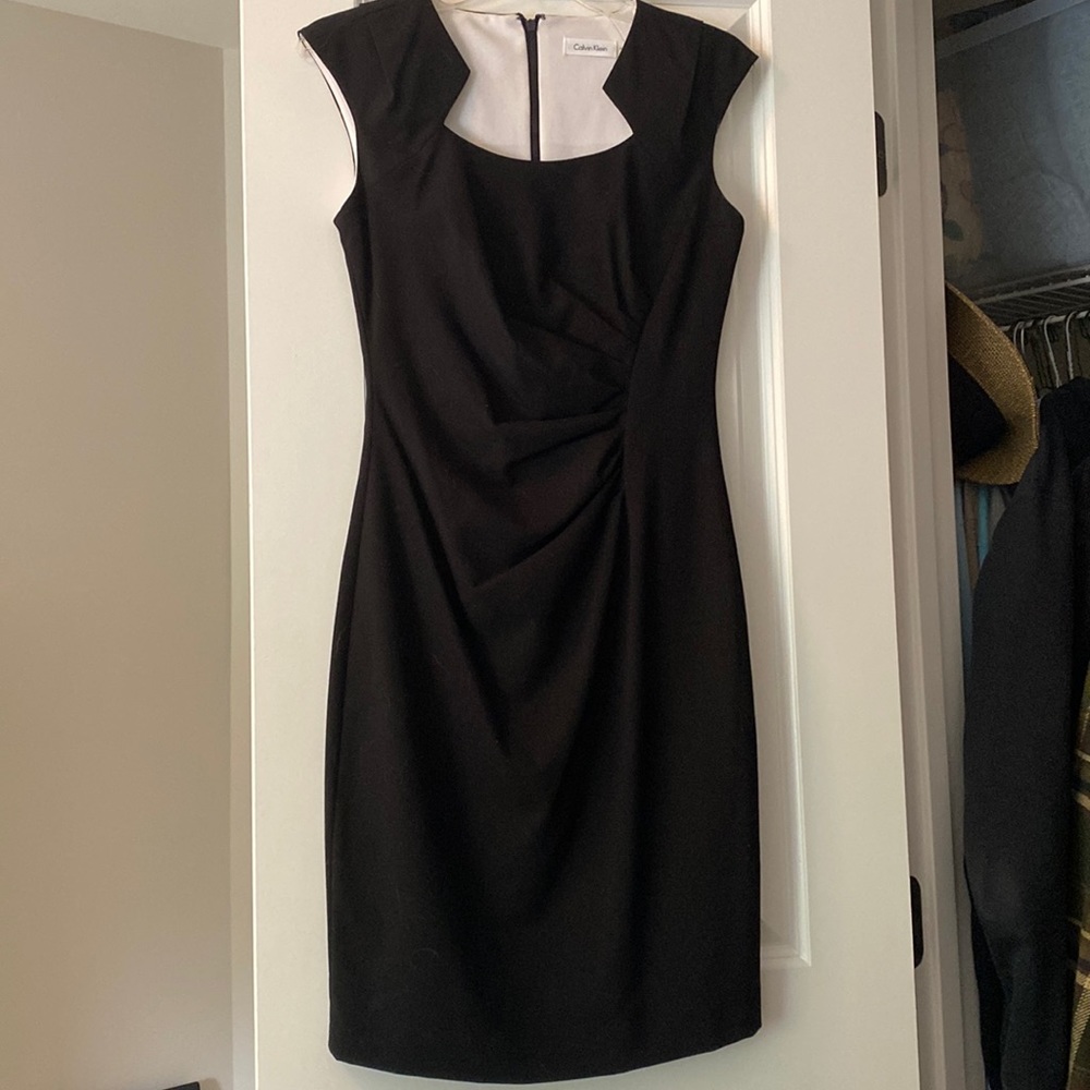 Black mini dress. Business attire